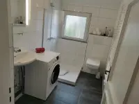 monteurzimmer-letmathe-badezimmer-mit-waschmaschine